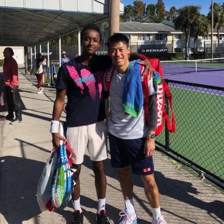 Mikael Ymer with @keinishikori during a game